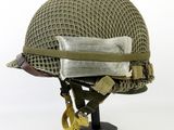 an image of a helmet on a stand on a white background