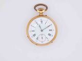 a gold pocket watch with roman numerals on the face