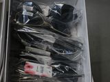 many pairs of scissors in a box on the table