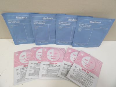 five packets of bioderm face masks sitting on top of a table