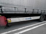 a truck that is parked on the side of the road