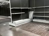 a empty store with shelves and shelves in the middle of the room