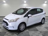 the white ford b - max is parked on a checkered floor