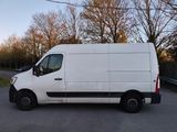 a picture of a white van parked in a parking lot