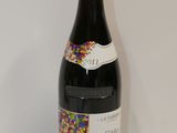 a bottle of wine that is sitting on a table