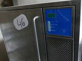 an image of a stainless steel refrigerator in a kitchen