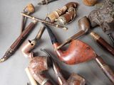 many different types of pipe smokings on the table