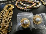 a lot of jewelry that is on a table