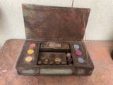 an old suitcase with a lot of makeup on it