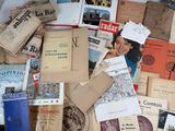 a pile of old books on a table