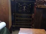 an image of a room with a table and a dresser
