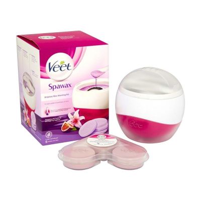 veet spa wax in a container with three cups of wax