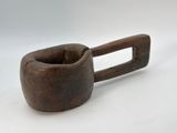 an old wooden pipe with a handle on a white background