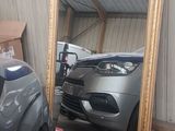 an image of a car in a garage with a large mirror