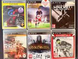 four video games on the table and one of them is for sale