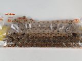 a picture of a bicycle chain that is wrapped in plastic