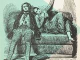 un livre sur lequel figure la photo d'un homme et d'une femme assis sur un canapé
