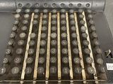 an old typewriter with many buttons on it