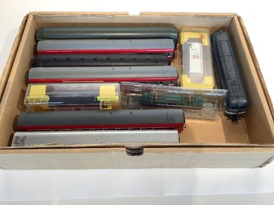a box with a bunch of different types of pens and pencils
