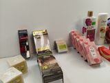 many different types of soaps on the counter