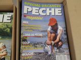 two magazines that are sitting in a box