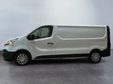 a white van that is parked in a parking lot