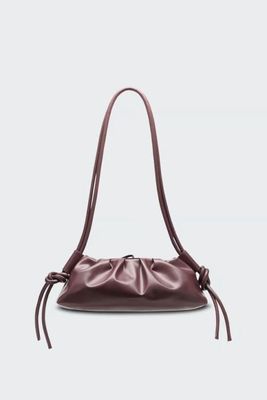 the pouch bag in burgundy leather