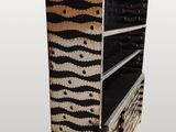 an image of a zebra print bookcase is shown in this image
