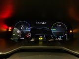 the dashboard of a car with a digital display on it ' s dashboard