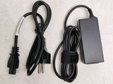 a charger and a power cord on a table