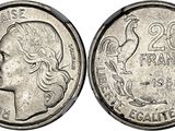 a close up of a coin with a woman ' s face on it