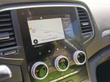 the dashboard of a car with a gps device in the center