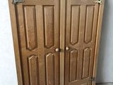 pair of antique oak double doors with brass hardware