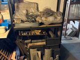 a shelf full of assorted items in a room