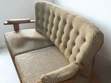 a couch that is sitting in the corner of a room