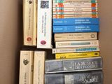 a box full of books that are sitting on the floor