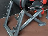 a red and black gym equipment on display in a room