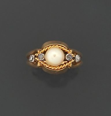 Bague en or jaune 18K 750 millièmes centrée d’une perle de c…