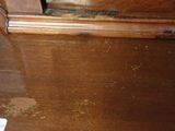a picture of a wooden desk with a wooden top