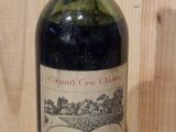 a bottle of wine that is sitting on a table