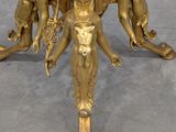 gold plated table with cherensils and cherensils on it