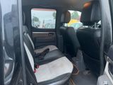 a car that has two seats in the back of it