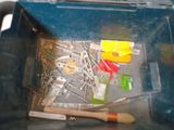 a blue box with a bunch of tools inside of it