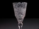 a glass that is sitting on a table
