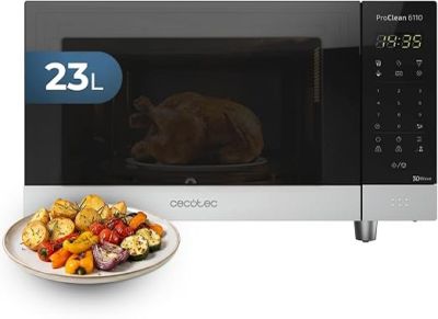 a plate of vegetables on a plate in front of a microwave
