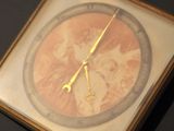 a picture of a clock that is on the wall
