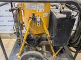 a machine that is sitting on a cart in a room
