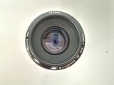 a camera lens that is sitting on a table