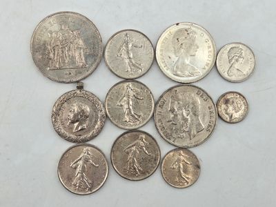 a close up of a bunch of coins on a table