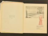 an open book with a drawing of a woman in a red dress
